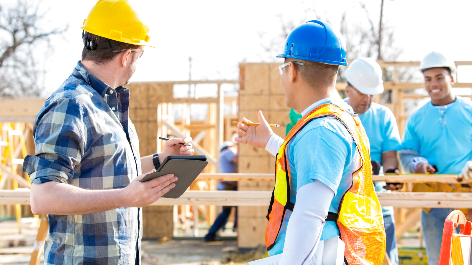 competency conversation with assessor on construction site